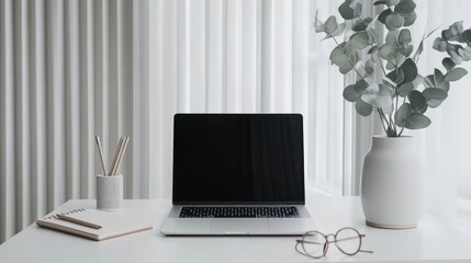 Fototapeta premium Minimalist Workspace with Laptop, Pencils, and Notebook