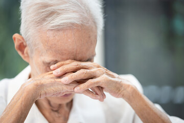Stressed worried elderly suffering from Anxiety Disorder,problems of insufficient financial after...
