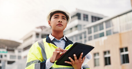 Woman, engineer and construction site with tablet, thinking and planning for project or development. Female person, technology and helmet for safety, infrastructure and industry as inspection expert