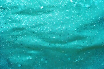 Abstract aquamarine glitter lights background