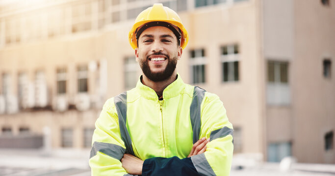 Portrait, engineer and man with construction site, arms crossed and project management with smile. Person, architecture or employee with hard hat, safety or building renovation with goals or pride