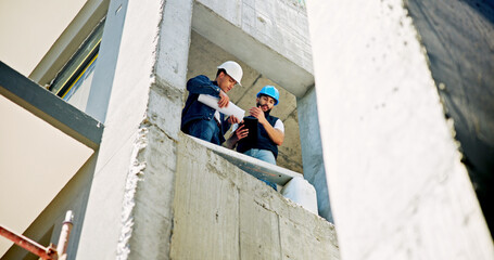 Businessmen, architect and building blueprint for industrial development or construction safety in city. Male people, civil engineer or contractors with helmet or floor plan for below architecture