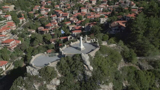 A top-down view of the Monument of Stemnitsa as the drone reveals the entire traditional village in the background