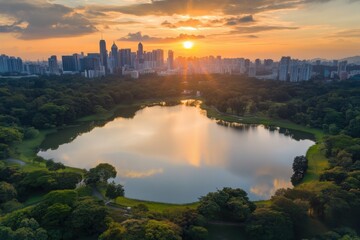 sunset over a city skyline reflecting on a serene lake
