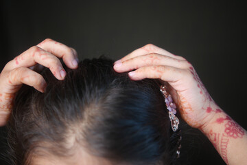 Naklejka premium child Scratching her Head closeup