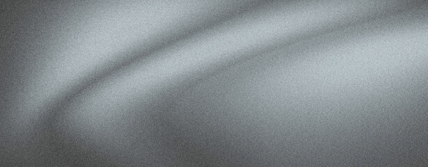 Grey fabric texture with soft folds and subtle lighting.