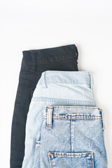 Pile of pants for men isolated on a white background with clipping path