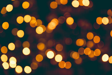 A warm Christmas bokeh background from the lights on a tree.