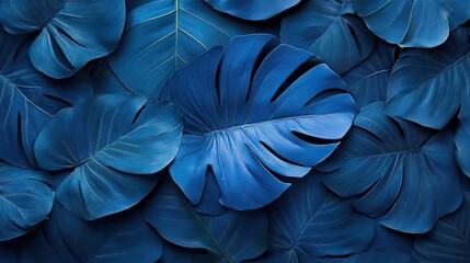 Fototapeta premium Tropical smooth pattern with large leaves and blue colors