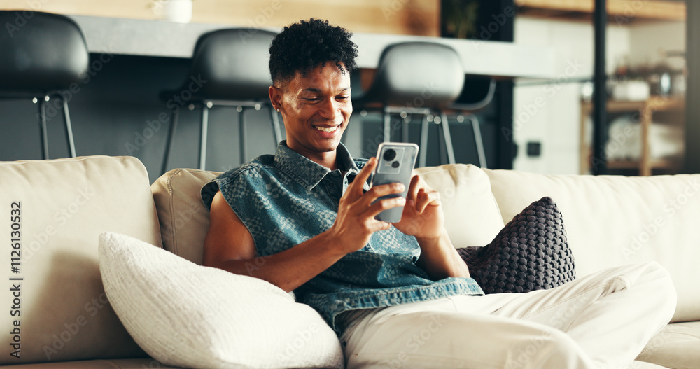 Poster house, relax and man on sofa, smartphone and typing with social media, connection and network. apart
