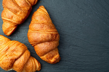 Group of sweet croissant . French morning breakfast . Top view