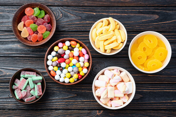 Mix of colorful candies . Top view