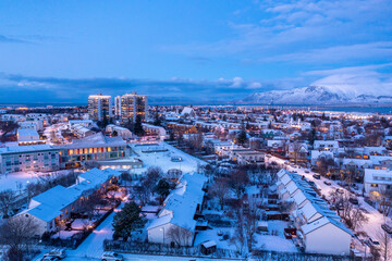 A city with snow on the ground