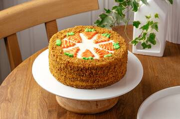 a whole carrot cake with cream