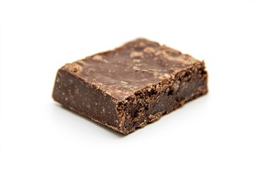 A piece of chocolate fudge on a white background, showcasing its rich texture and color.