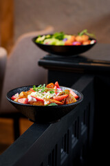 Tasty and juicy salads with sauces