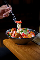 Tasty and juicy salads with sauces