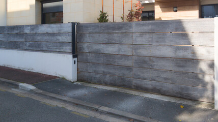 wooden gate slide closed of private house suburb wood portal home door