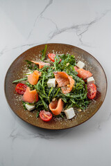 Tasty and juicy salads with sauces