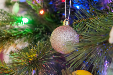 Christmas tree decorations, glitter balls and garland lights