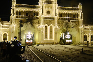 Christmas train with steam locomotive and illumination