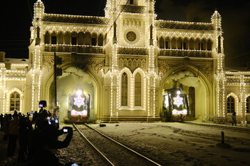 Christmas train with steam locomotive and illumination