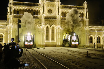 Christmas train with steam locomotive and illumination
