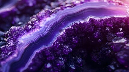 A vibrant, abstract close-up of layered purple gemstone patterns resembling agate, featuring deep textures and luminous gradients.  .