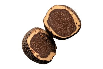 Fresh black Norcia truffles isolated on white transparent background, great for culinary and gourmet themes.