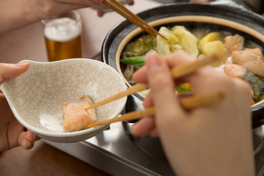 Eating around Hokkaido-style Ishikari nabe