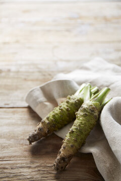 Cloth and wasabi on wooden tabletop