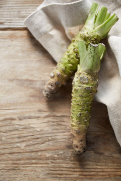 Cloth and wasabi on wooden tabletop