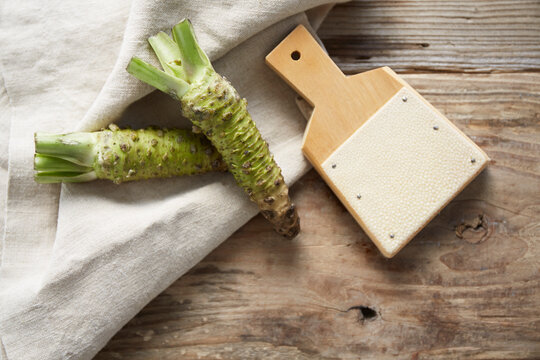 Samegawa grater and wasabi on a wooden table