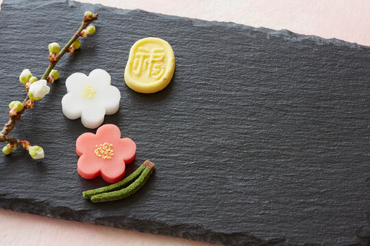 Japanese sweets on a black stone
