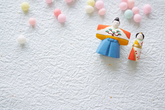 Hina dolls and hina arare on washi paper