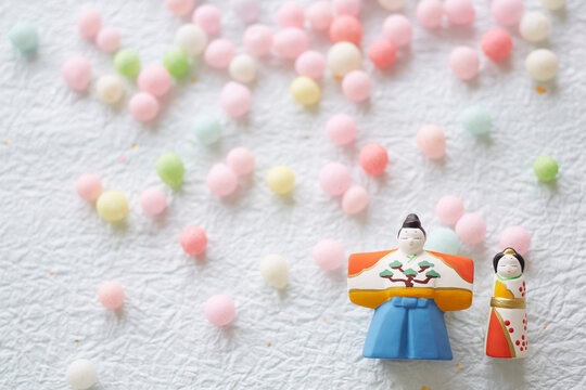 Hina dolls and hina arare on washi paper