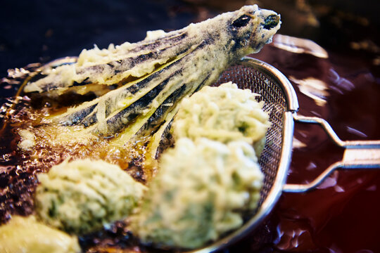 Process of frying aubergine tempura
