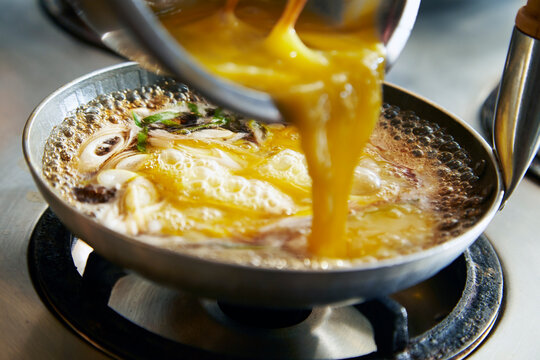 Photograph of the process of making tamagodon