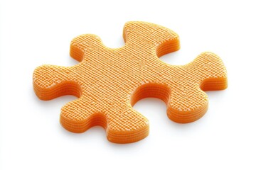 Obraz premium A bright orange puzzle piece with a textured surface and rounded edges