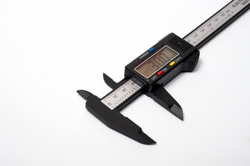 Electronic caliper with display photographed on a white background.