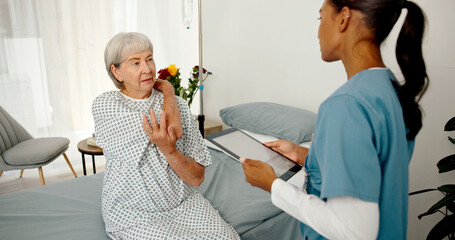Back pain, tablet and nurse with senior woman in hospital for medical service, consulting and...