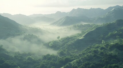 Obraz premium Peaceful Morning Mist Over Rolling Hills in a Serene Landscape