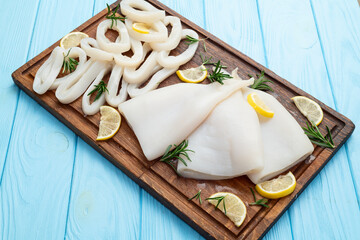 Squid tube and ring photography . Seafood top view