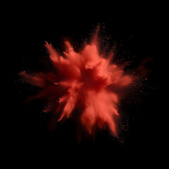 Red powder explosion against black background