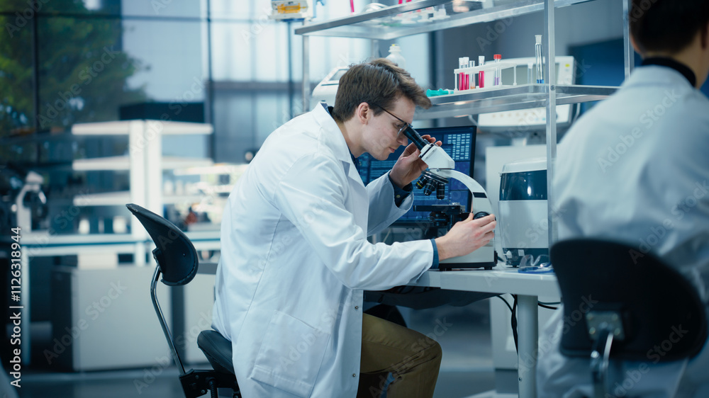 Poster molecular biology research scientist looking at a dna sample under a microscope in an applied scienc