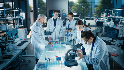 Head of Laboratory Making a Bioengineering Experiment with a Group of Young Science College...