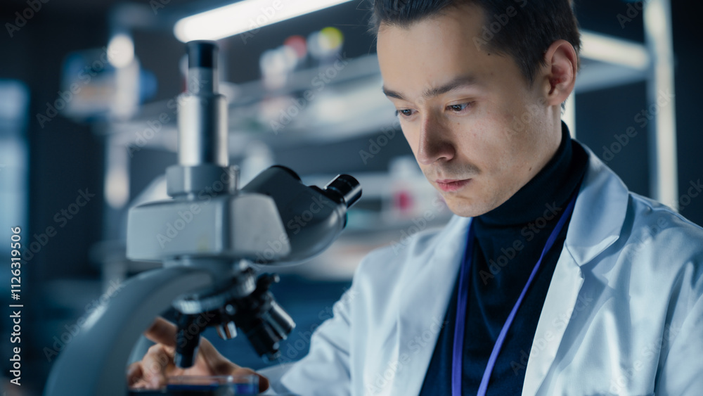 Poster portrait of a handsome chemistry student working on a research project in university. medical resear