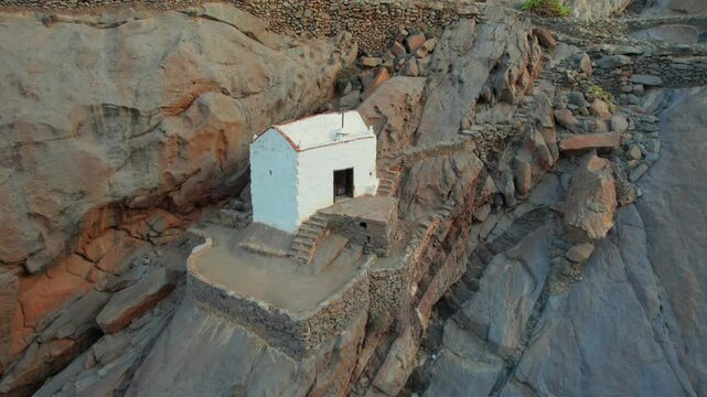 Fantastic aerial shot over the small Malpaso hermitage that is located in the Las Pe&ntilde;itas ravine on the island of Fuerteventura. Canary Islands.