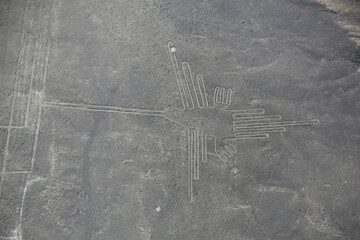Aerial view of Nazca Lines - Hummingbird geoglyph, Peru.