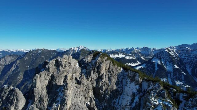 Time lapse aerial shot around the mountain Alpsitz in Liechtenstein next to Switzerland and Austria. Perfect weather consition with a stunning view over the alps.